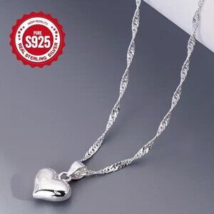 STERLING CHAINED HEART
